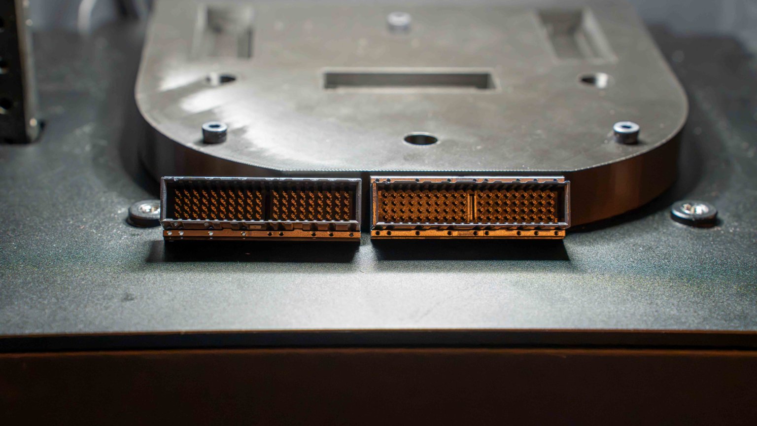 Close-up of two slightly bent pins inside a high-density server connector