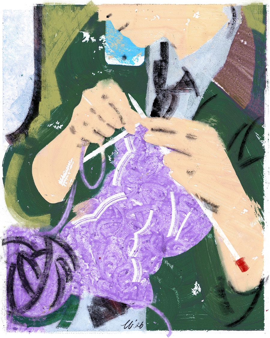 Young man knitting on a commuter train