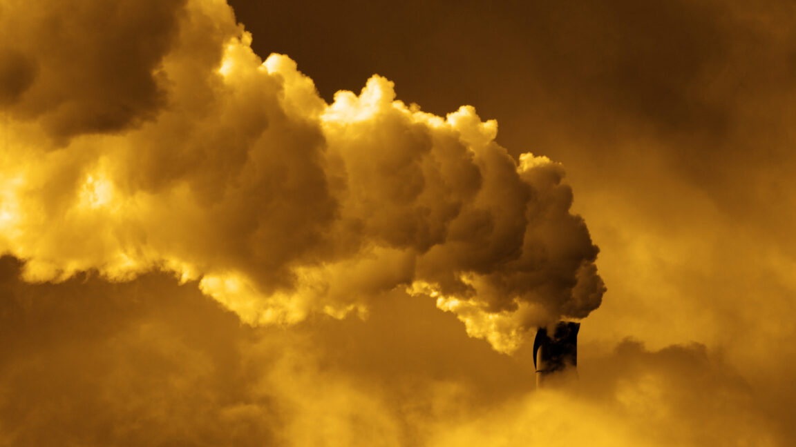 Smoke spewing from a gas power plant chimney