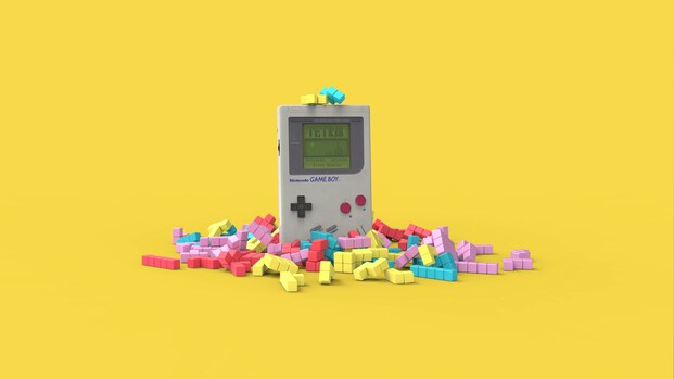 Ein Game Boy und Tetris-Steine