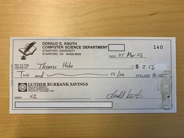 Thomas Hühn's signed reward check from Donald Knuth